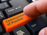 Communities of Practice - Concept on Orange Keyboard Button.
