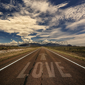 Conceptual Image of Road With the Word Love
