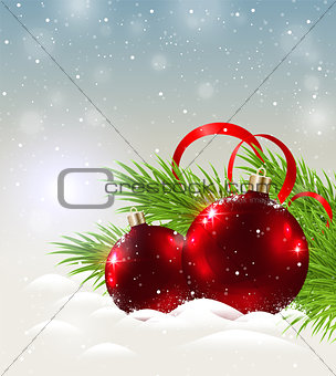 Two shining red decorations in snow