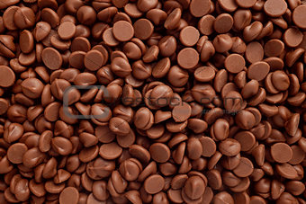 Milk chocolate chips background