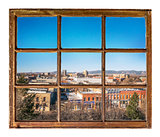 cityscape view through vintage window