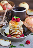 Breakfast with apple pancakes with honey 