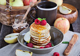 Breakfast with apple pancakes with honey 