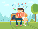Couple with smartphone outdoors