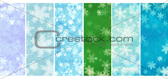 Set of banners with grunge Christmas backgrounds with snowflakes