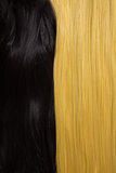 Texture of black and golden blond hair 