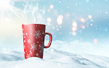 Christmas mug nestled in snow
