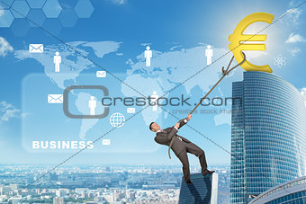 Man climbing skyscraper with euro sign
