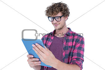 Happy handsome man using tablet computer
