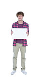 Happy handsome man holding blank paper