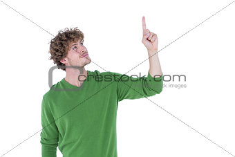 Happy handsome man pointing something