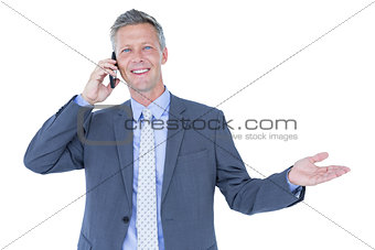 Portrait of a successful businessman on phone