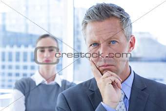 Puzzled businessman in the office