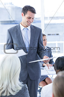 Businessman give a paper