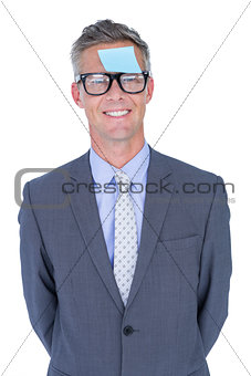 Businessman with post it on his face