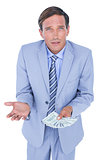businessman holding bribe