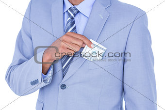 businessman holding bribe