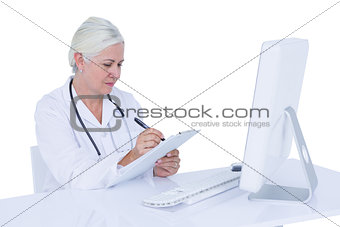 Doctor working on her computer