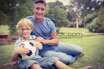 Happy father with his son at the park