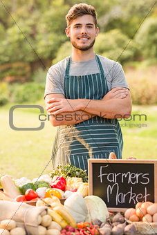 Handsome farmer standing arms crossed