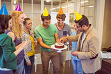 Business people celebrating a birthday