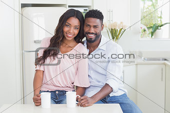 Happy couple having coffee together