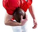 American football player taking a ball on her hand