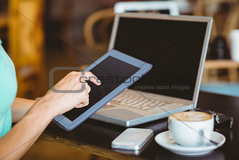A woman using tablet computer