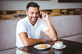 Young man smiling on the phone