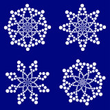 white snowflakes on dark blue background