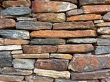 Stone wall pattern from old log cabin chimney