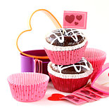 Festive pastry for Valentine's Day, chocolate muffin with red hearts