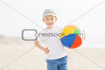 kid with beach ball