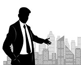 Businessman at city background