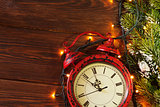 Christmas alarm clock, tree branch and lights