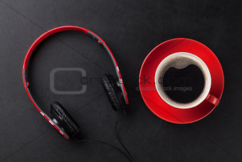 Headphones and coffee cup