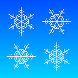 Vector snowflakes white isolated on blue