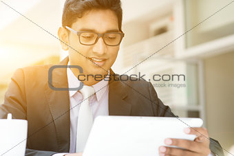Business man, tablet pc and coffee