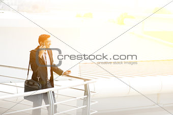 Businessman using smartphone at outdoor