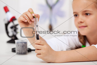 Young student in elementary school science class