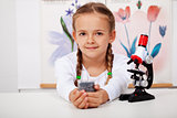 Young girl in biology class