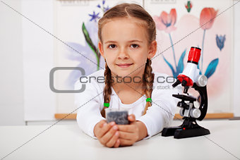 Young girl in biology class