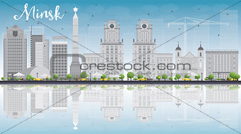 Minsk skyline with grey buildings and blue sky.