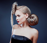 young elegant woman with creative hair style leopard print