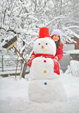 girl with snowman 