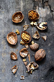 Walnuts on rustic old wooden table