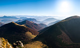 Panoramic landscape view of beautiful autumn hills and mountains