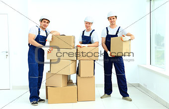 workers unload boxes