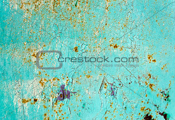 Rusty painted blue metal texture with cracked paint.
