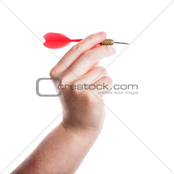 Female hand holding dart 